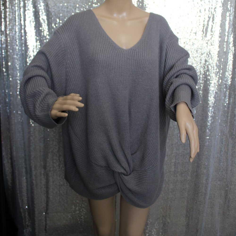 Cozy, comfy chunky grey sweater knotted at bottom hem